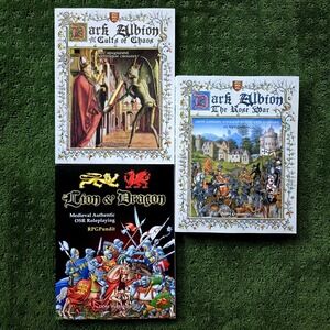 RPGPundit Book Lot Dark Albion Lion & Dragon Medieval Grim Fantasy Roleplaying